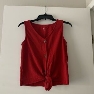 Red tank top with button detail and front.